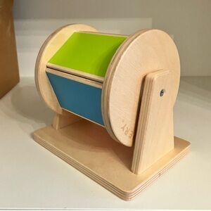 Montessori develop fine/gross motor skills, color,cause/effect.bell